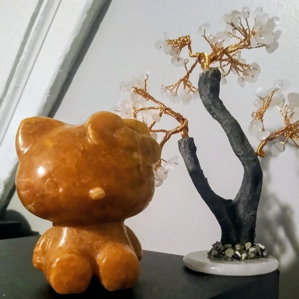Hello Kitty Figurine carved from Orange Calcite